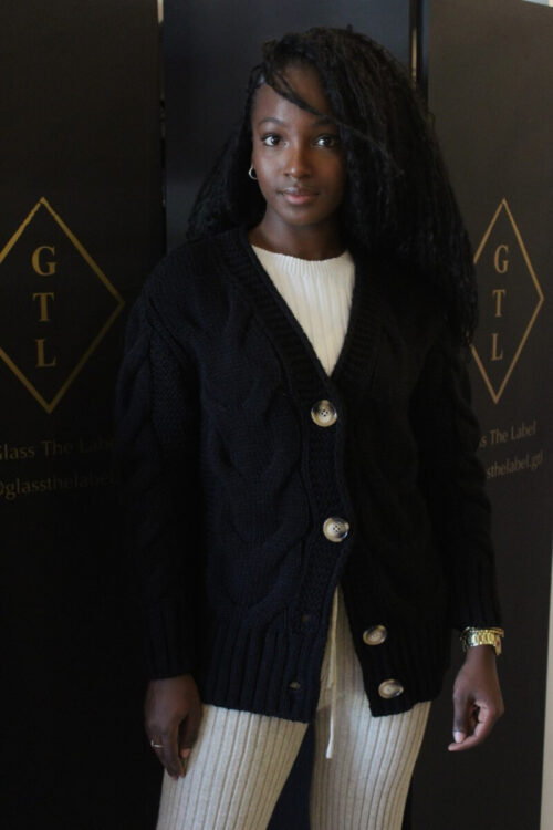 Black cable-knit long sleeve cardigan with oversized buttons