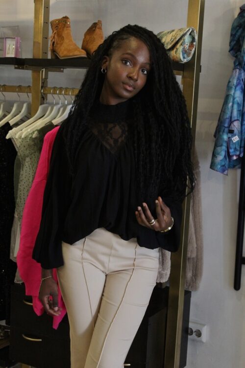 Black lace blouse with draped sleeves